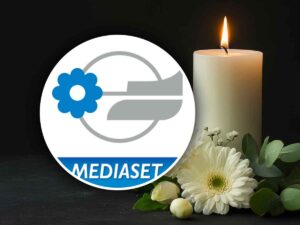 logo mediaset e candela a lutto