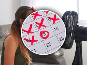 Calendario e donna accaldata col ventilatore