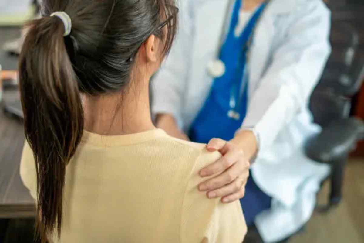 donna curata in Ospedale