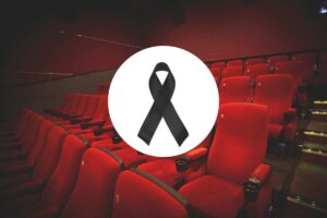 segnale di lutto e una sala cinematografica